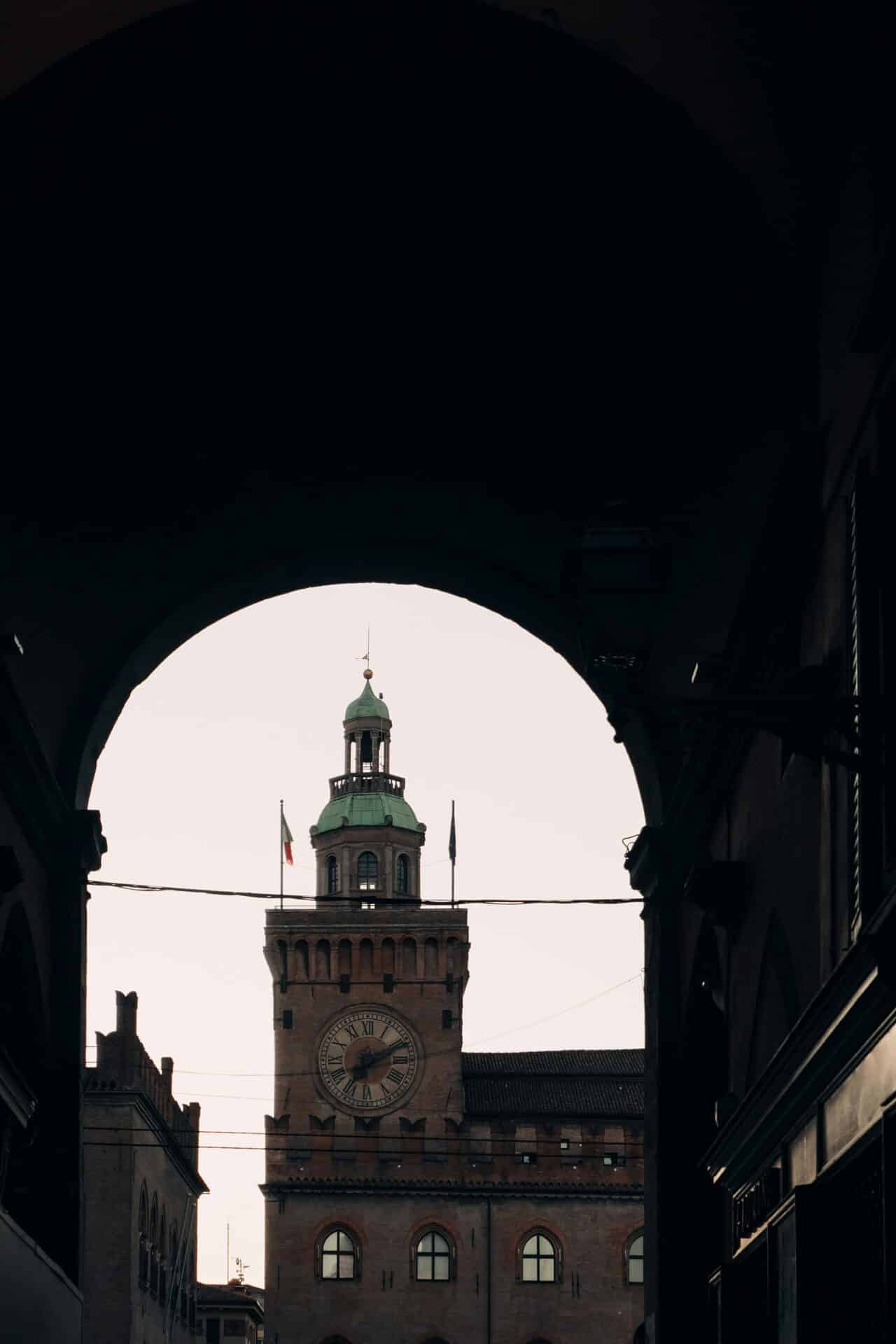 Torre dell'Orologio Viewed Through an Arch in Bologna