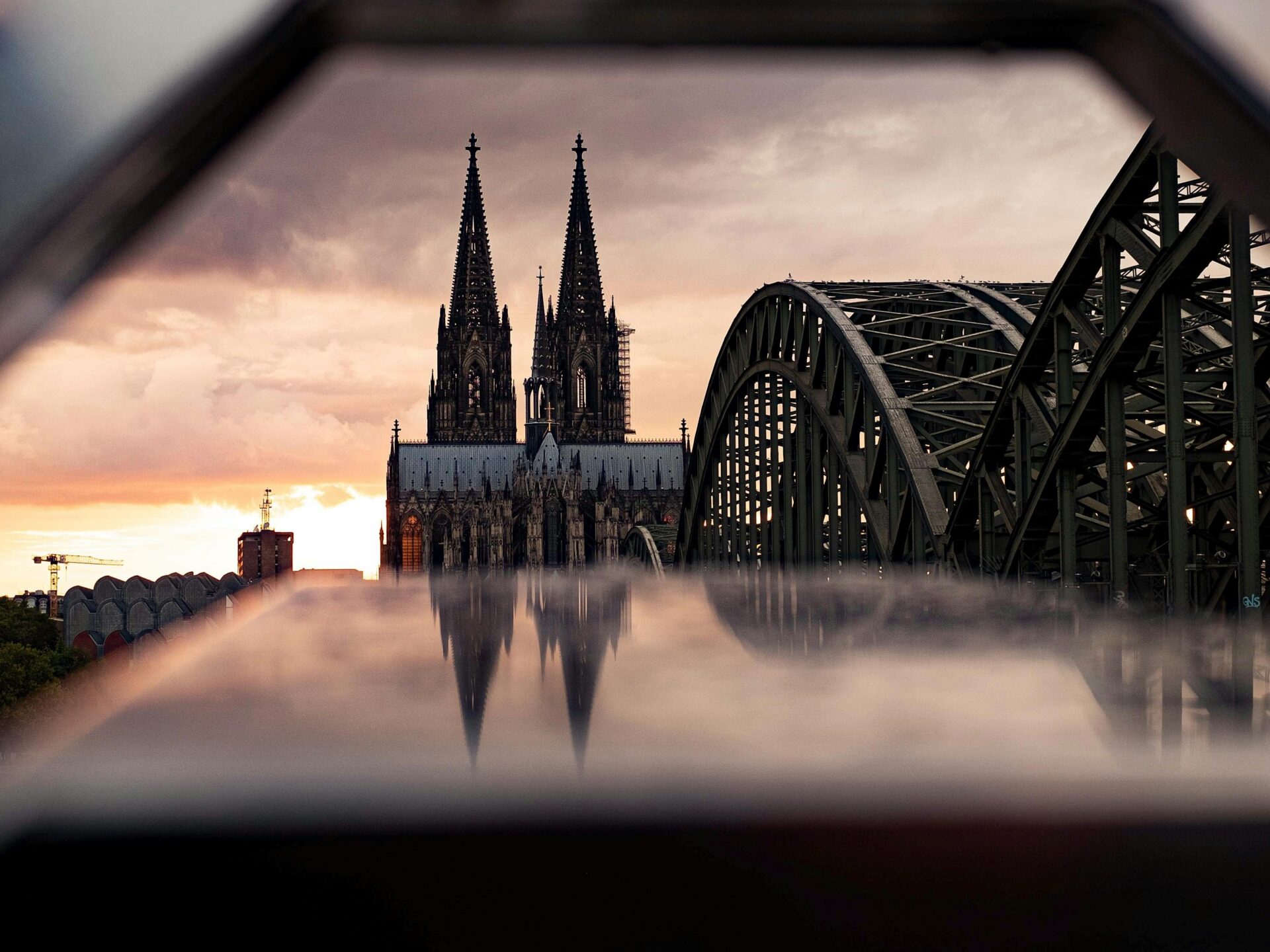 Cologne Cathedral and Hohenzollern Bridge at Sunset